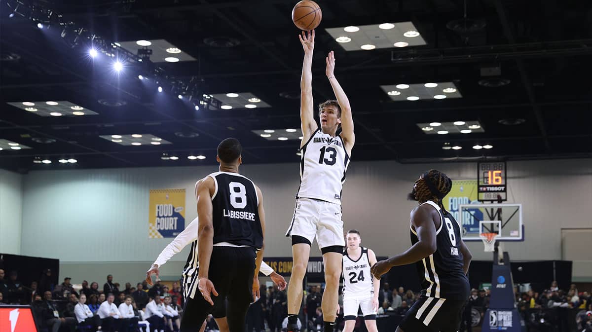 Team Giraffe Stars forward Matas Buzelis (13) of the G League Ignite shoots the ball over Team BallIsLife forward-center Skal Labissiere (8) of the Stockton Kings during the G-League Next Up game at Indiana Convention Center.
